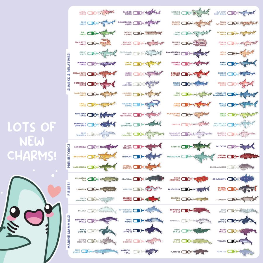Promo graphic showcasing a WIDE variety of colorful sea animal acrylic charms, organized by category: Sharks & Relatives, Prehistoric, Fishes, and Marine Mammals. Each charm has a corresponding colored clip. The background is a soft purple, with a teal-colored Great White Shark in the bottom left corner with a heart next to his head, with text "Lots of New Charms!"