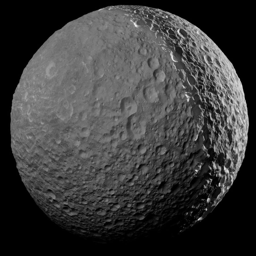 The "back side" of Mimas without the massive crater is, well, covered in much smaller craters that pockmark the surface. There's no additional geology to be observed, just endless craters.