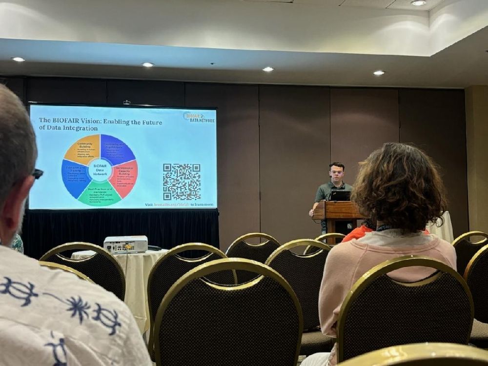 Me standing at a podium talking about the BIOFAIR Vision and roadmap.