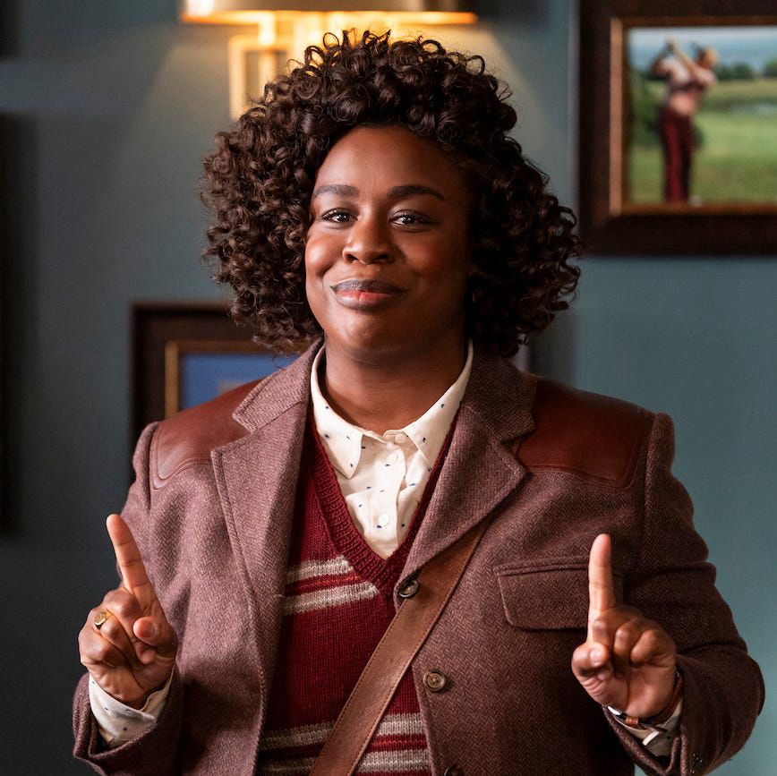Cordelia Cupp (Uzo Aduba) in a tweed jacket and knitted tank top, looking *remarkably* Doctor-y