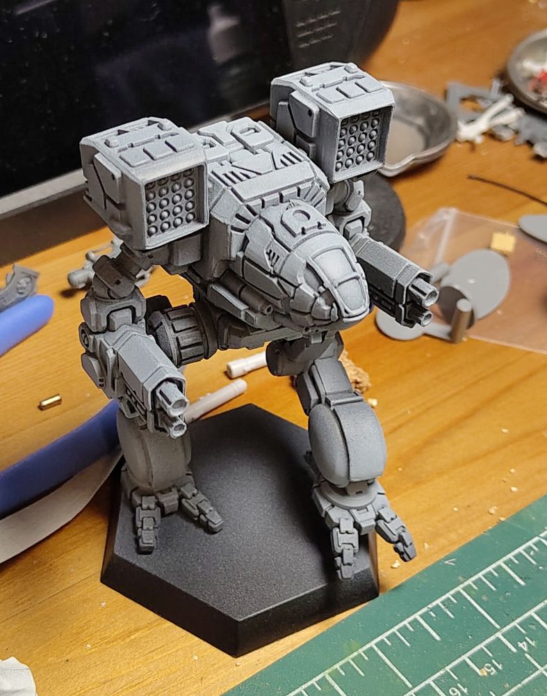 Grey timber wolf mech model prepared for painting