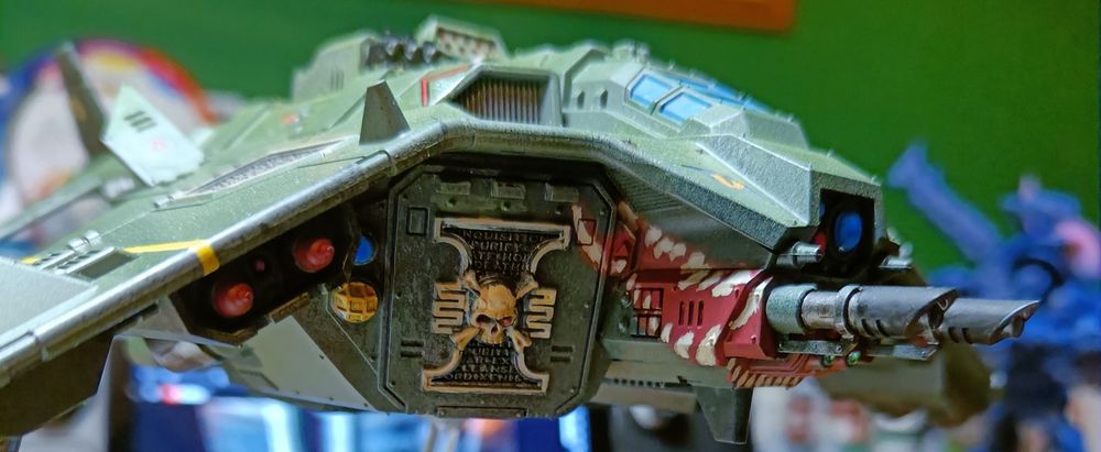 Green flyer from game Warhammer 40k with drawn on shark mouth.