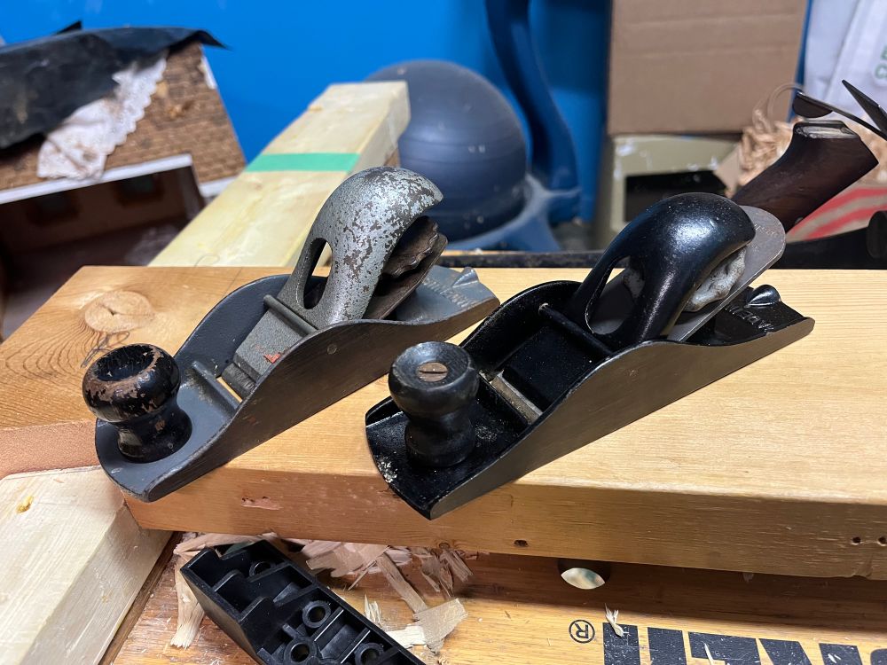 The two hand planes after a good cleaning and some time spent scraping off rust. They’re shiny clean and usable now! One is bare steel and one is painted black, which you couldn’t really tell from the previous pictures.