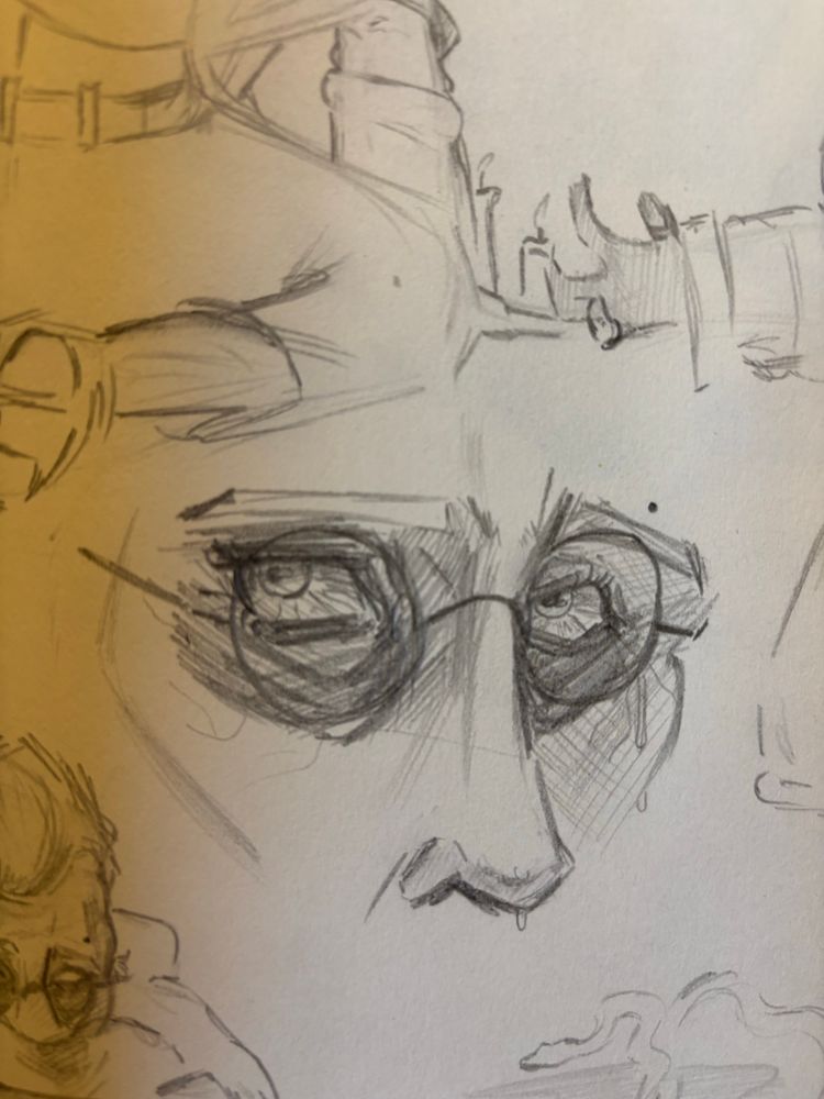 Close up of a man’s eyes, bloodshot and looking to the man’s right.