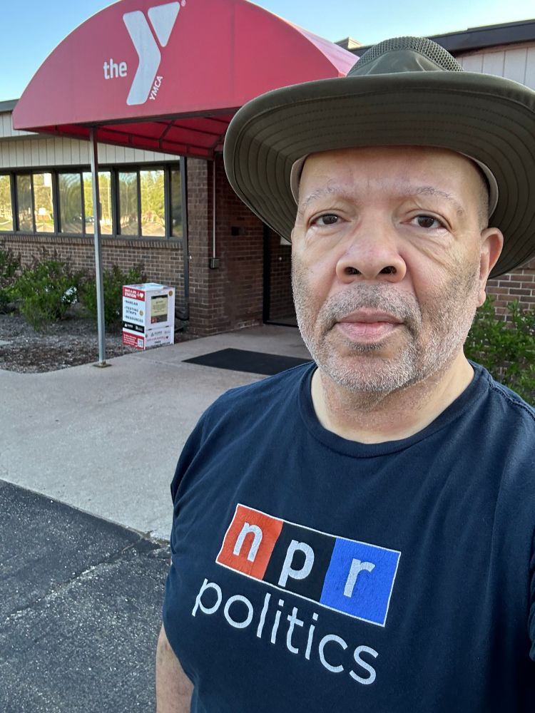 Selfie in front of a YMCA wearing an NPR politics shirt