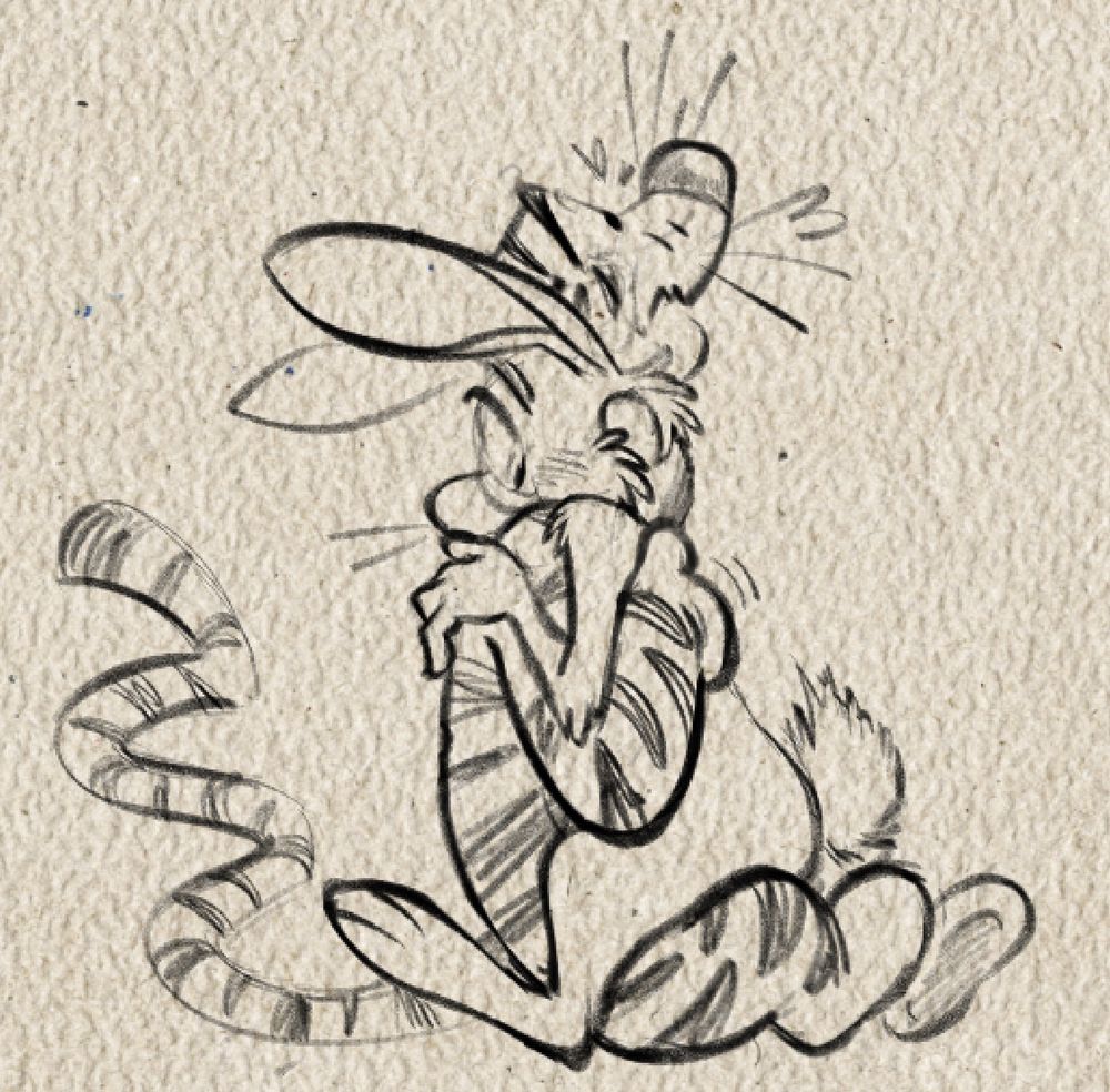 Tigger and Rabbit from “Winnie the Pooh” in a tight embrace. Both appear flustered, sat on the floor with Rabbit on Tigger’s lap.