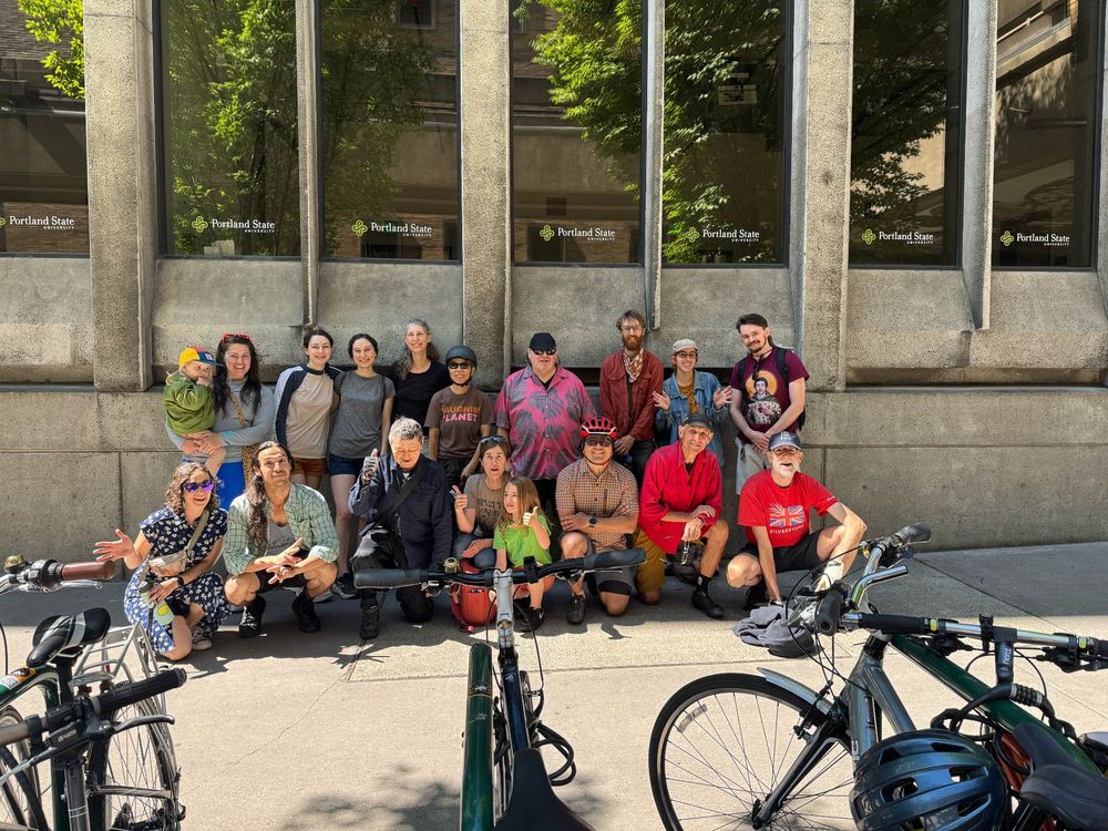 Farmers market cyclists including young families