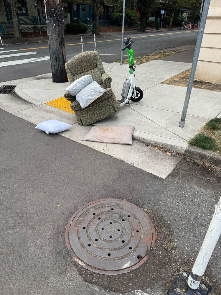 Stuffed chair on top of Lime scooter 