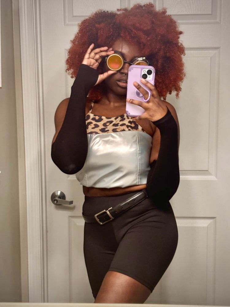 Beeth posing in a mirror selfie dressed as the cunty fuzzy octoling from splatoon