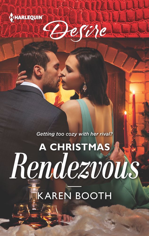 A couple about to kiss in front of a romantic fire. Book title is A Christmas Rendezvous. 