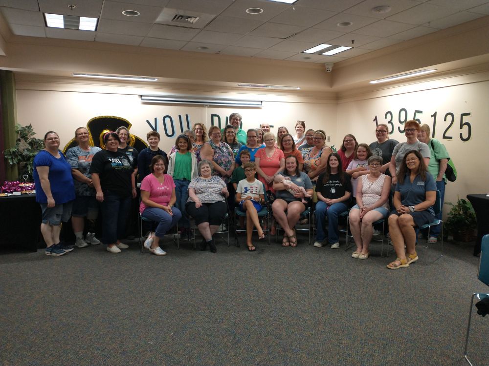 A group of people gathered together for a photo. 