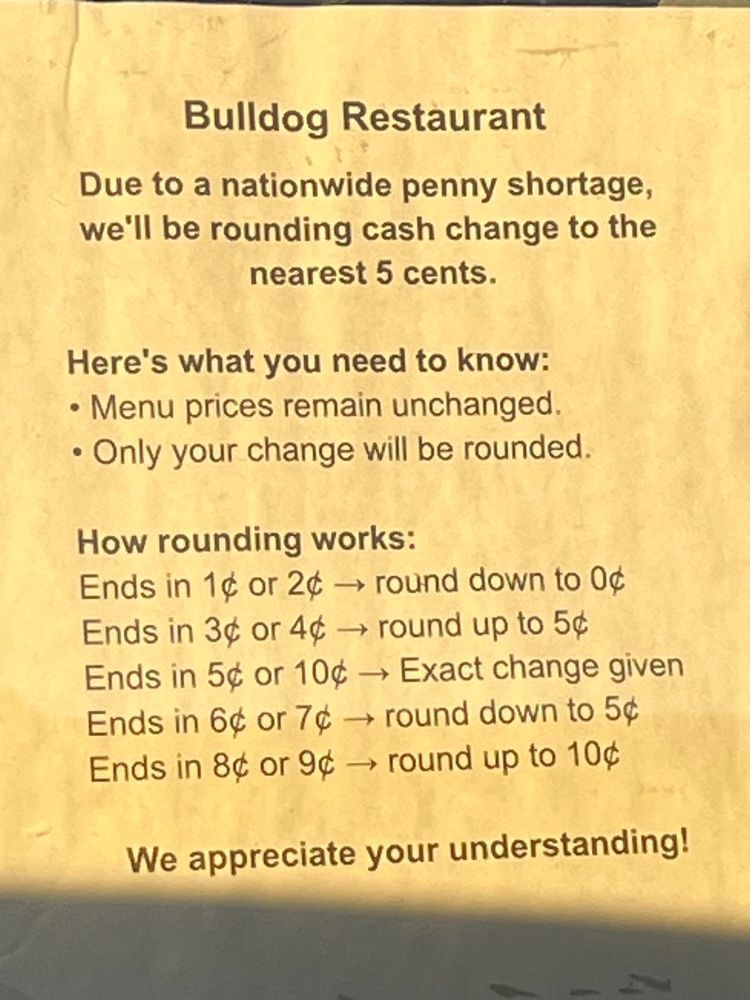 Notice regarding the U.S. penny shortage. 

How they will round up or down in giving change. 