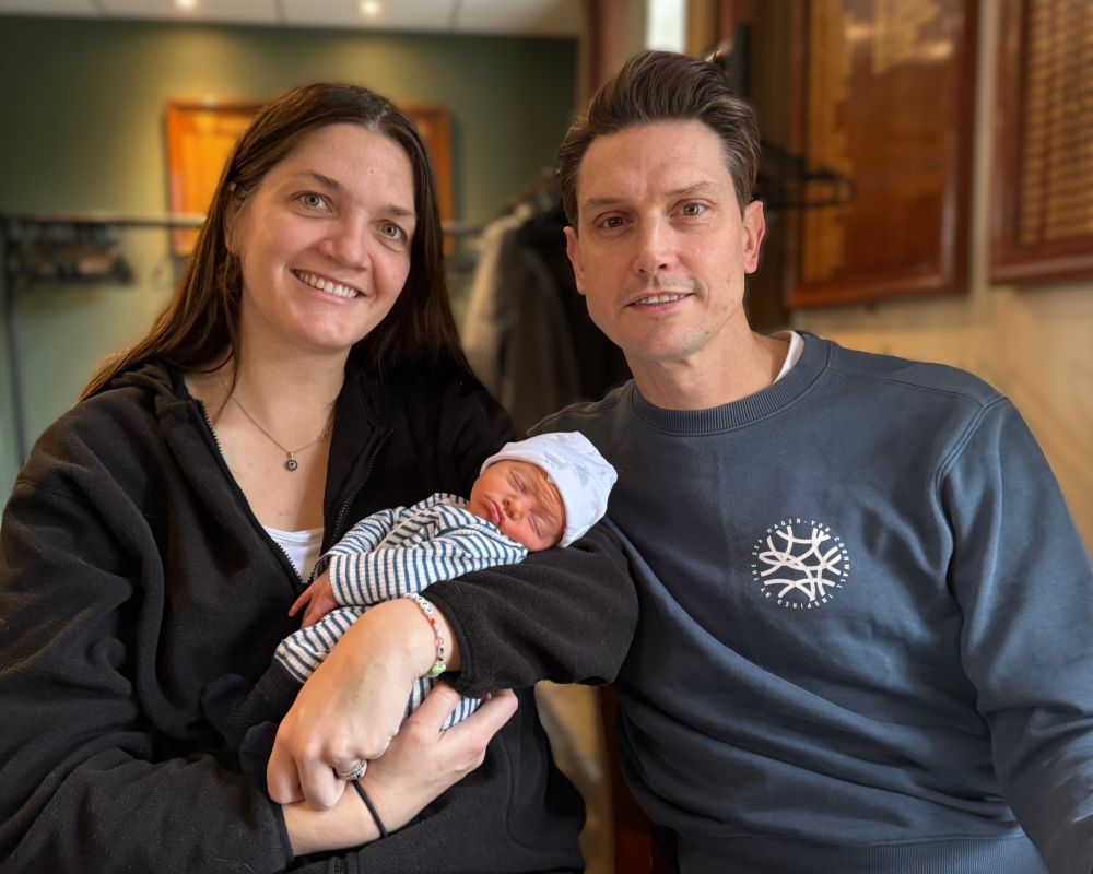 Lucy Isaac, with husband Adam and baby Rafferty.