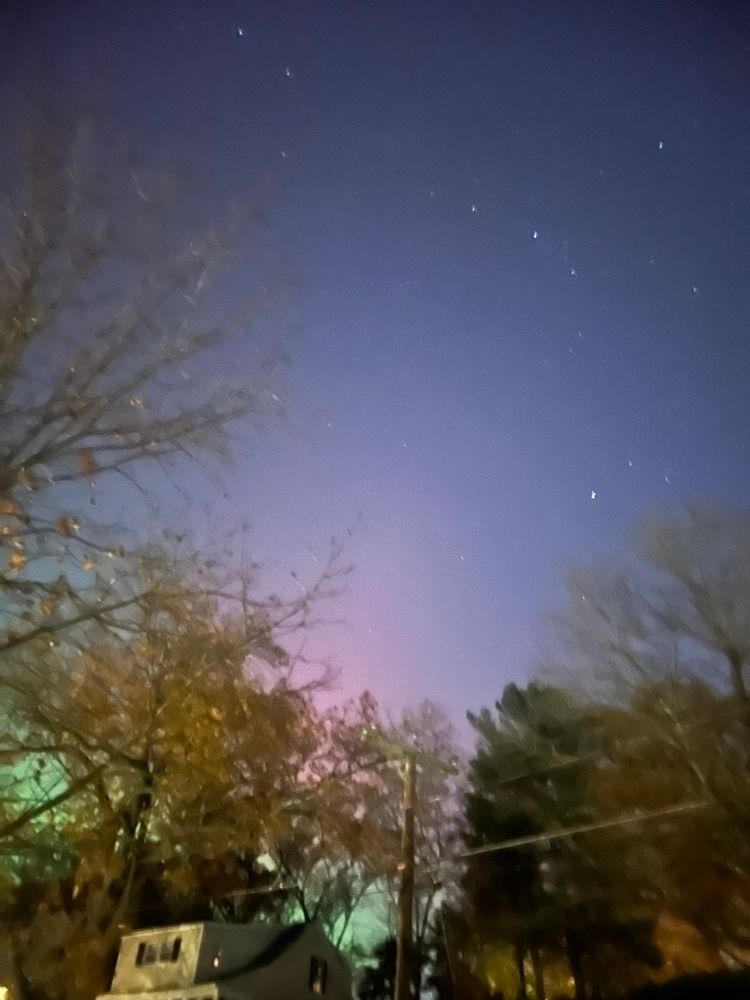 Northern lights in New England.  Pinks and greens in the sky.