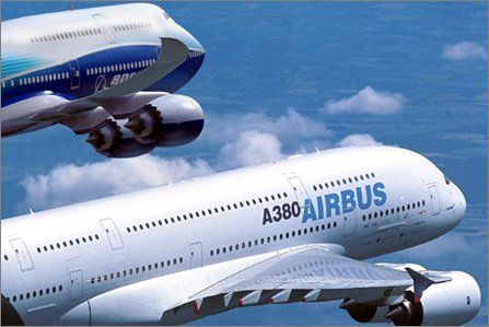 An Airbus A380, the world's largest passenger plane, flying next to a Boeing 747, the world's 2nd largest passenger plane.