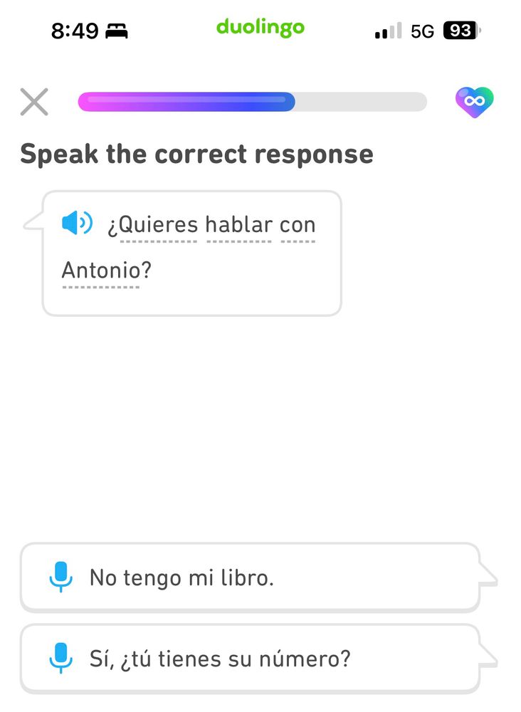 A Duolingo screen displays a Spanish prompt asking “¿Quieres hablar con Antonio?” (“Do you want to talk to Antonio?”) with two possible spoken response options. The first option says “No tengo mi libro.” (“I don’t have my book.”) and the second says “Sí, ¿tú tienes su número?” (“Yes, do you have his number?”). The second option is marked as the correct response.