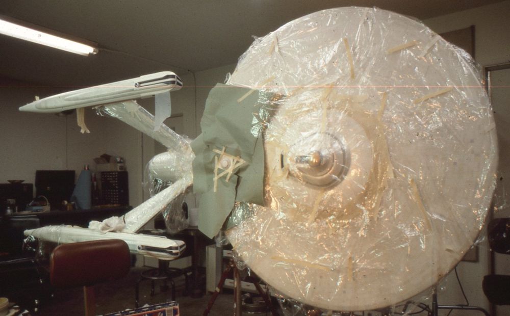 Enterprise Refit studio model wrapped in translucent plastic, presumably for during painting. 