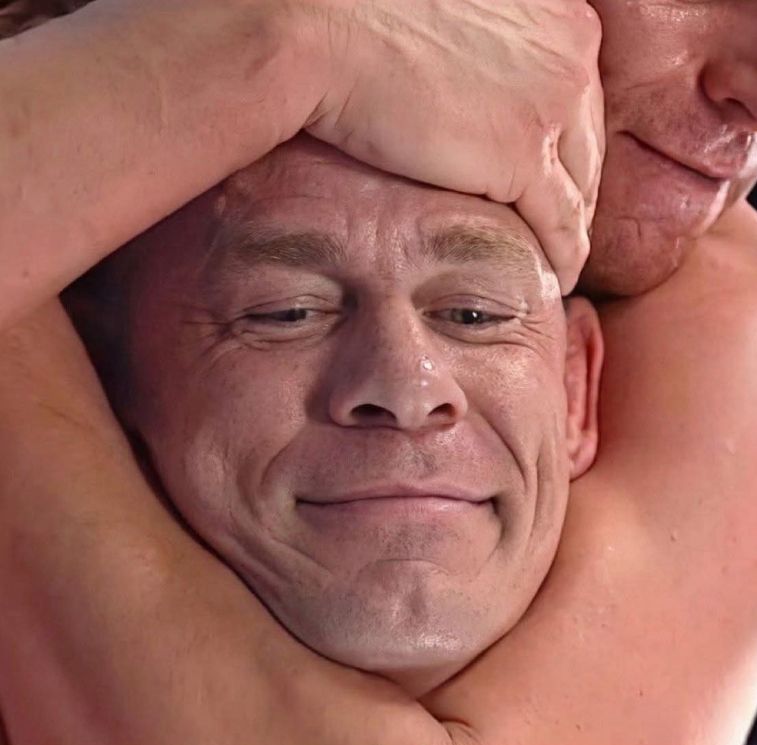 John Cena being choked out w/ a resigned smile.