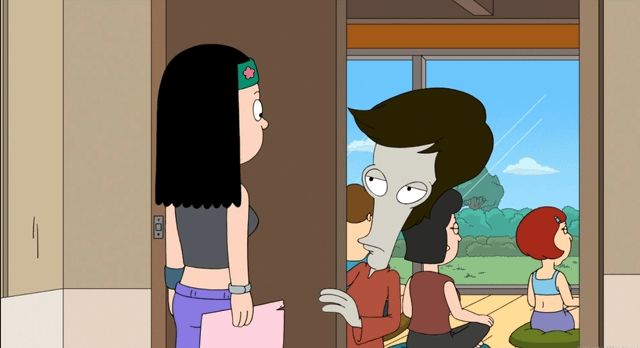 Hayley at the door for a Yoga Session.

Roger is standing in the doorway with a deadpan stare.