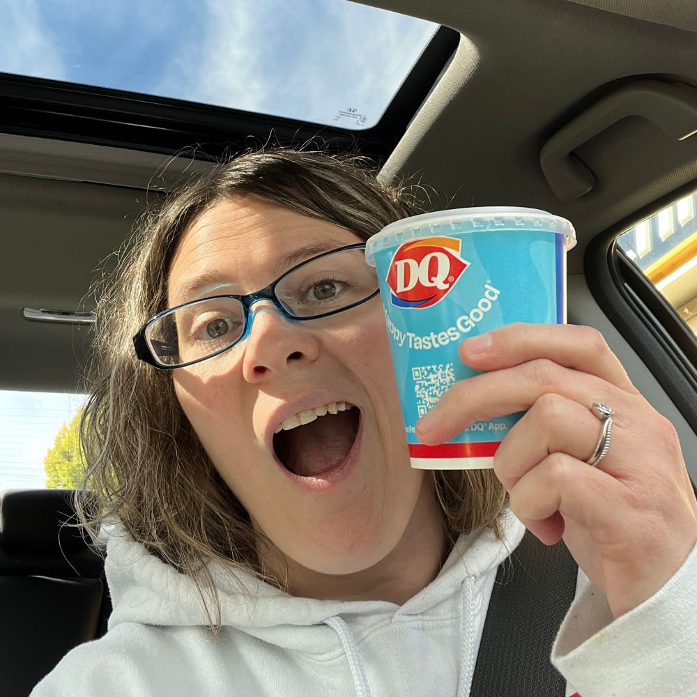 Allison holding up a Blizzard from Dairy Queen.