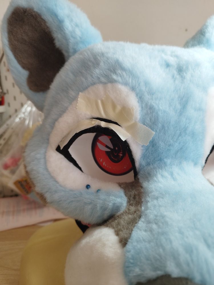 Left side of a fursuit head, the eyelash is not finished yet