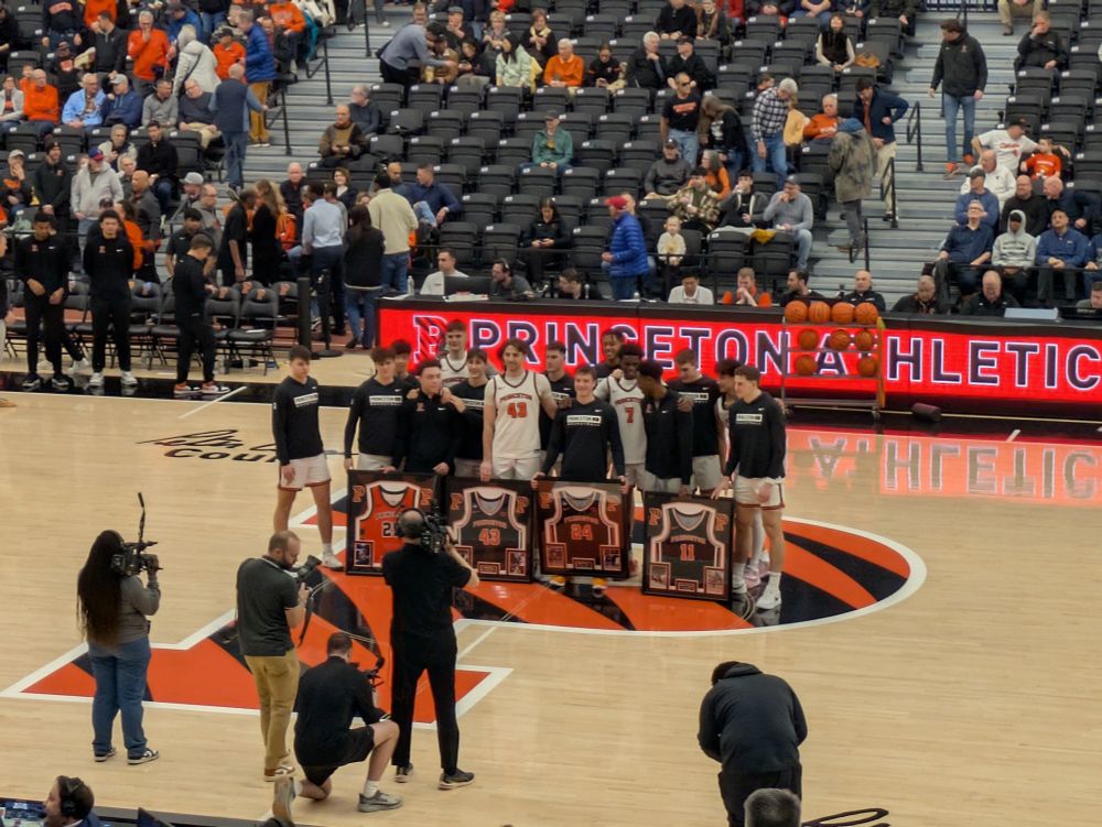 Princeton Tigers basketball seniors being honored on the court pregame.