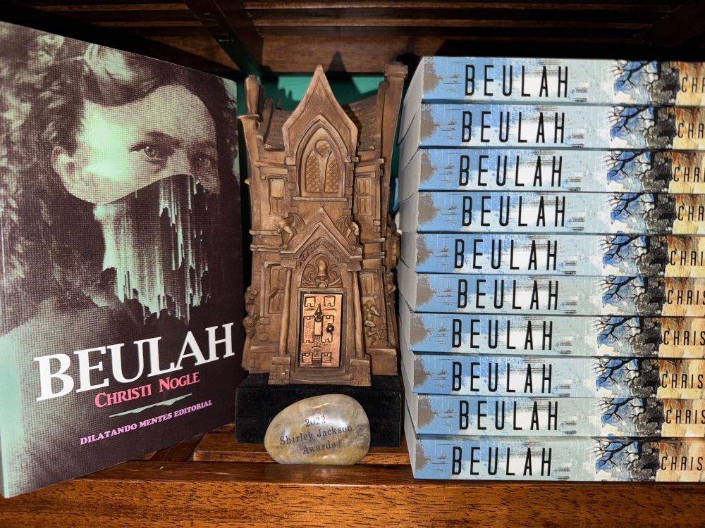 Copies of the novel Beulah, Bram Stoker Award, and Shirley Jackson nominee rock.