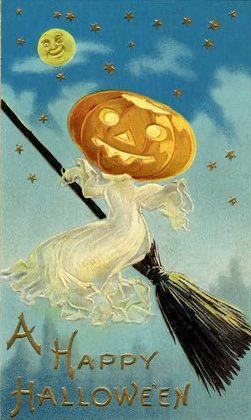 Vintage Halloween card:
‘A Happy Halloween’ 
A witch in a white dress with a large pumpkin head on a broomstick, gold stars, full moon, night sky with clouds. 