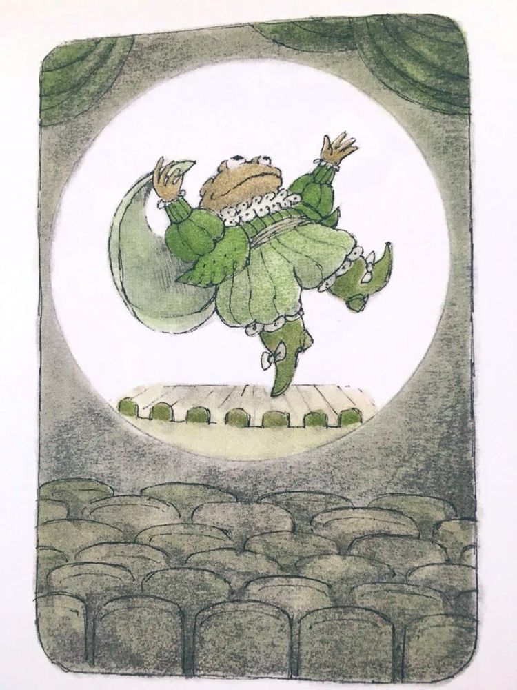 Toad from the "Frog and Toad" series, performing on a stage. The character is illuminated by a spotlight, wearing an elaborate green costume with ruffles, a cape, and buckled shoes, and is striking a dramatic pose with arms raised. The stage has a wooden floor, and in the foreground, rows of empty theater seats are visible. Illustration.