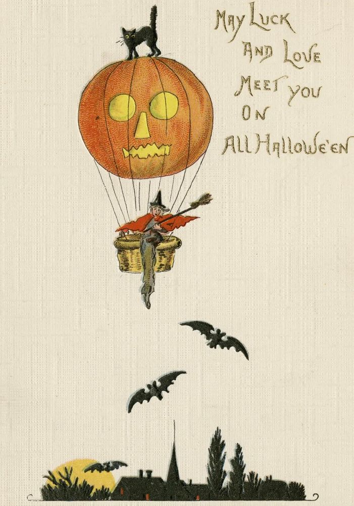 Vintage Halloween card ‘May LUCK
AND LOVE
MEET you on 
ALL HALLOWE’EN’
Witch with broom in pumpkin hot air balloon flying over bats flying over a silhouette of a town, a black cat rides on top of the pumpkin.