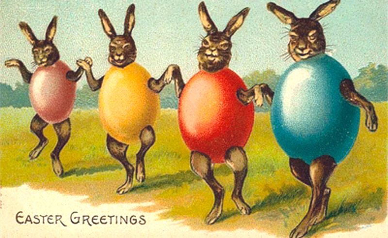 Hares wearing red, pink, blue and yellow eggs holding hands and dancing. Easter Greetings.