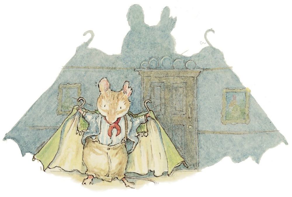 An illustration from the children's book series Brambly Hedge by Jill Barklem. It features a mouse-like character holding a pair of green, wing-like garments on hangers. The character is standing in a room with a wooden door and two framed pictures, and a large, bat-like shadow is cast on the wall behind it.
