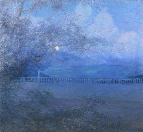 The Lovers’ Promenade. This painting depicts a serene, moonlit landscape with a prominent tree on the left side, its branches extending across the upper portion of the canvas. In the middle ground, a fence or railing stretches horizontally, seemingly separating the foreground from a more distant, hazy area. The overall color palette is dominated by cool blues and muted grays, creating a tranquil and somewhat ethereal atmosphere, characteristic of a nocturnal scene illuminated by moonlight and soft, diffused light from the sky.