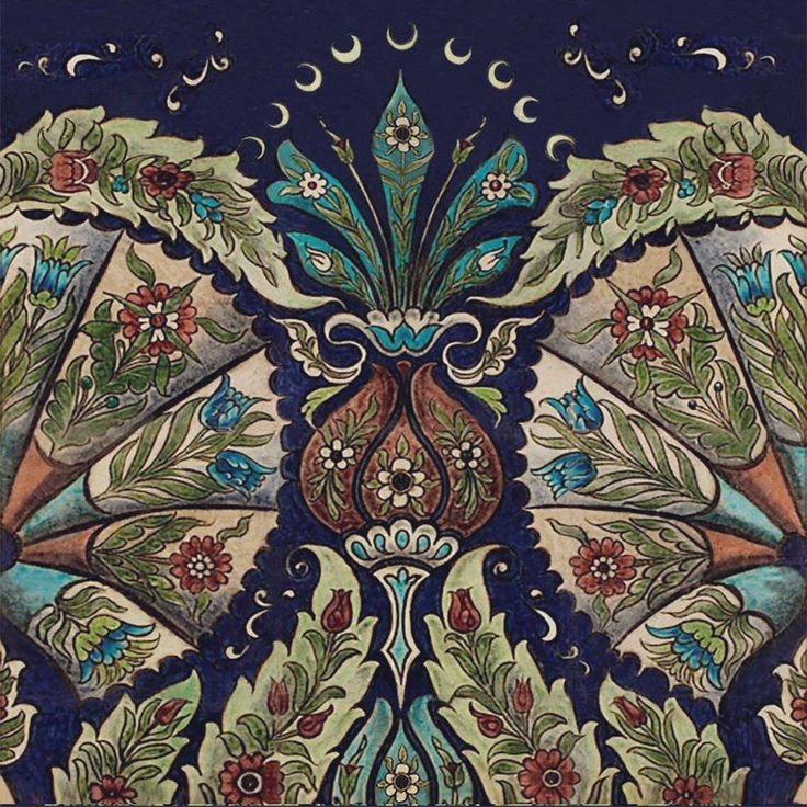 Iznik Empress accent tile, a reproduction design inspired by original tiles created for Leighton House. The design draws heavily from historical Islamic and Ottoman Iznik tiles. The background colour is a deep, rich blue. The primary decorative elements feature a mix of teal, green, terracotta, and white.
A stylized, tear-drop or urn-shaped motif sits at the center, filled with smaller floral details.
The pattern is highly symmetrical, with mirrored floral and leaf elements extending outwards from the centre. Various stylized flowers and scrolling leaves (known as rumi motifs) and small crescent moon shapes are visible along the top border of the design.