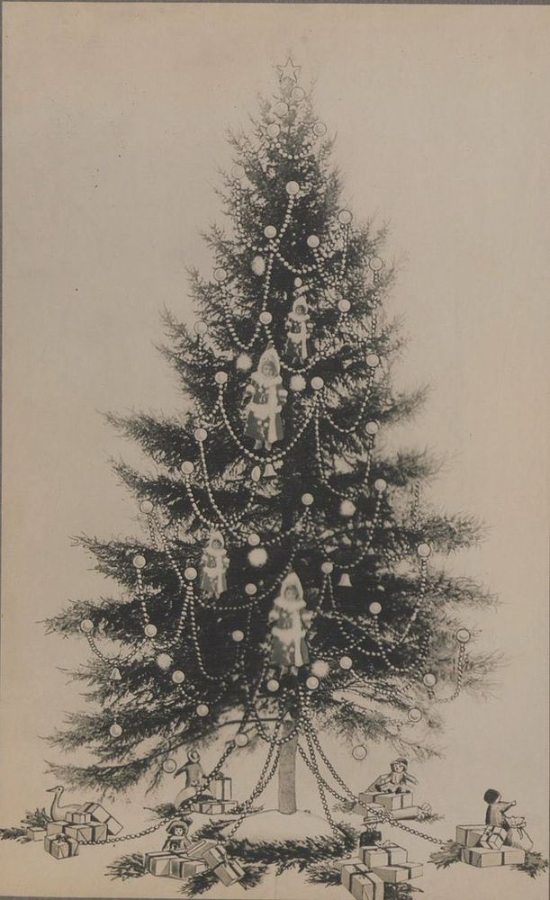 Old B&W image of a decorated Christmas tree.