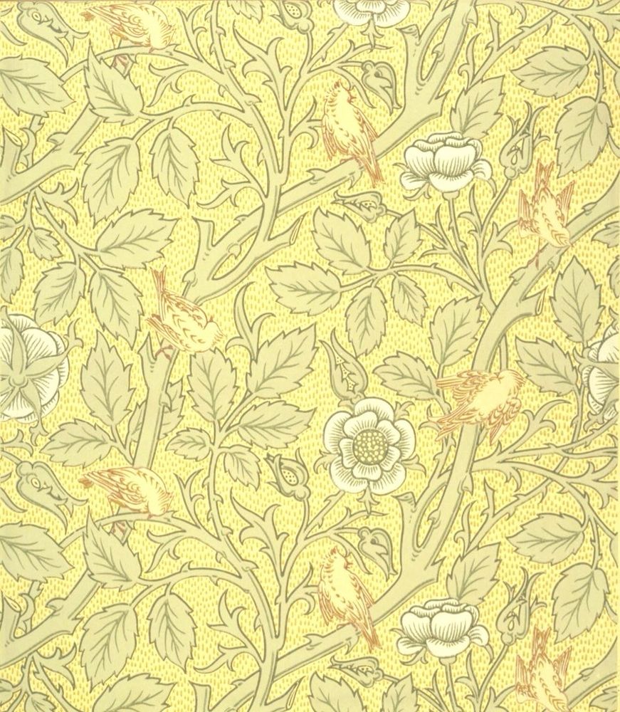 A repeating pattern typical of a wallpaper design, featuring birds perched among stylized branches and foliage with prominent white flowers, set against a pale yellow, flecked background. Designed for Morris & Co.