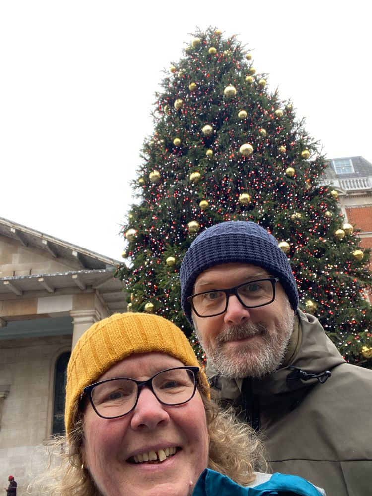 A photo of Becky and Philip by Covent Garden Christmas tree