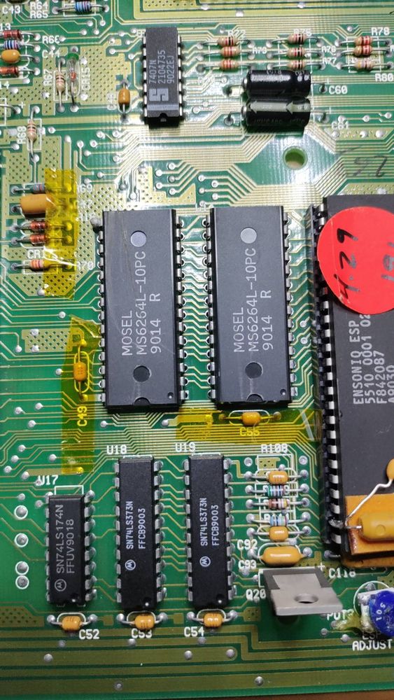 A board protected by tape to prevent accidental damage to nearby components