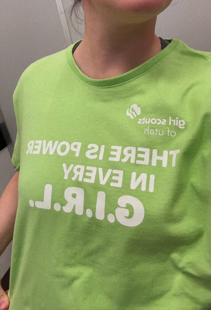 A Girl Scouts of Utah t-shirt that says, “There is power in every girl.”