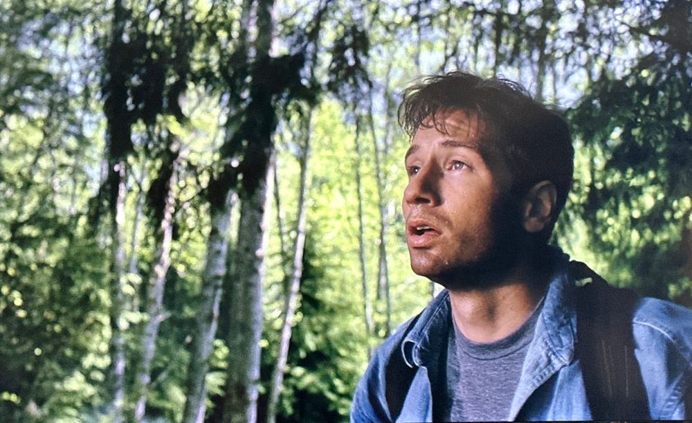 Mulder looking up, he’s tired and sweaty.