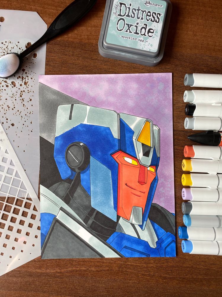 Traditional artwork of Transformers Earthspark character Breakdown (a male robot character with an orange face, a blue helm, and a mainly blue and grey color scheme). Colored with alcohol markers, which can be seen to the side of the image on the table.