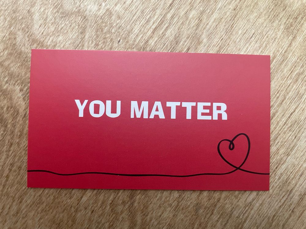 Red card that says YOU MATTER with a heart at the bottom