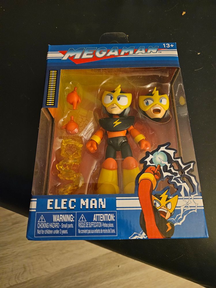 A brand new Mega Man Elec Man toy in package looking fabulous!