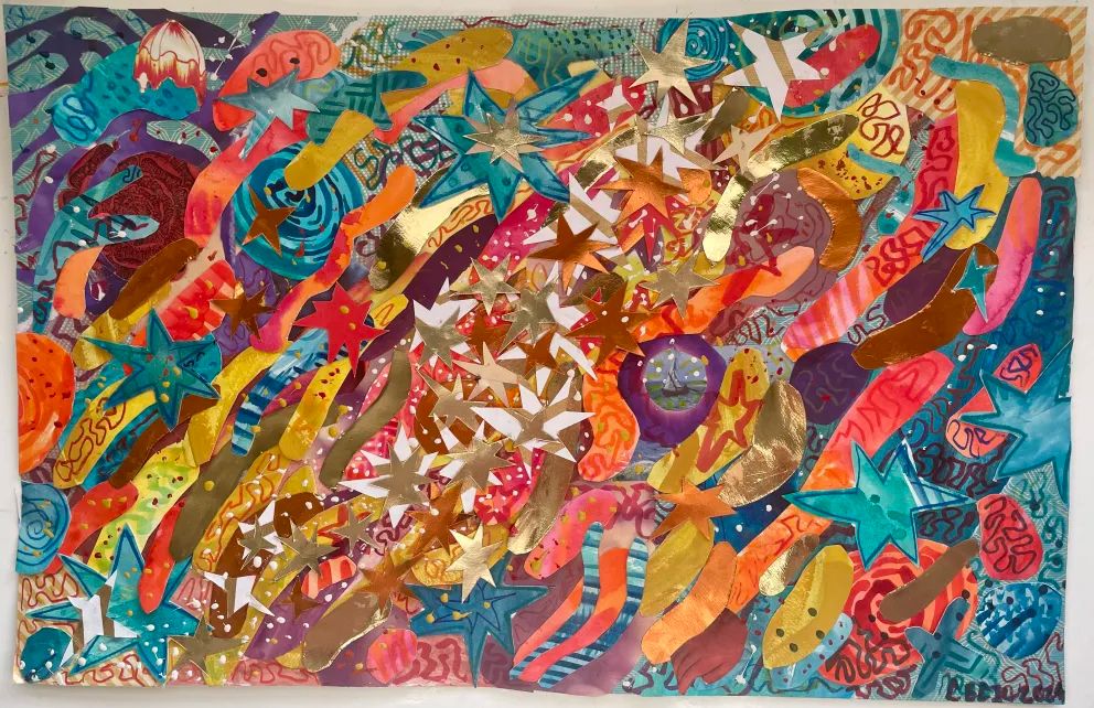 A non-representational collage comprised of many pieces of printed, painted, and colored paper. The overall composition moves diagonally across the piece, with the lightest colors and most of the metallic gold elements focused in a diagonal line from the top right to bottom left corners. The center also contains many star shaped pieces, in contrast to the blob-like shapes that form the majority of the rest. From the center outwards the colors change from white and gold to pink, purple, orange, and yellow, out to teal, blue, and purple. An image of a sailboat on the ocean is located slightly off center, surrounded by a purple halo cut from paper. The piece is signed in the bottom right, reading 'Cecil 2024'.