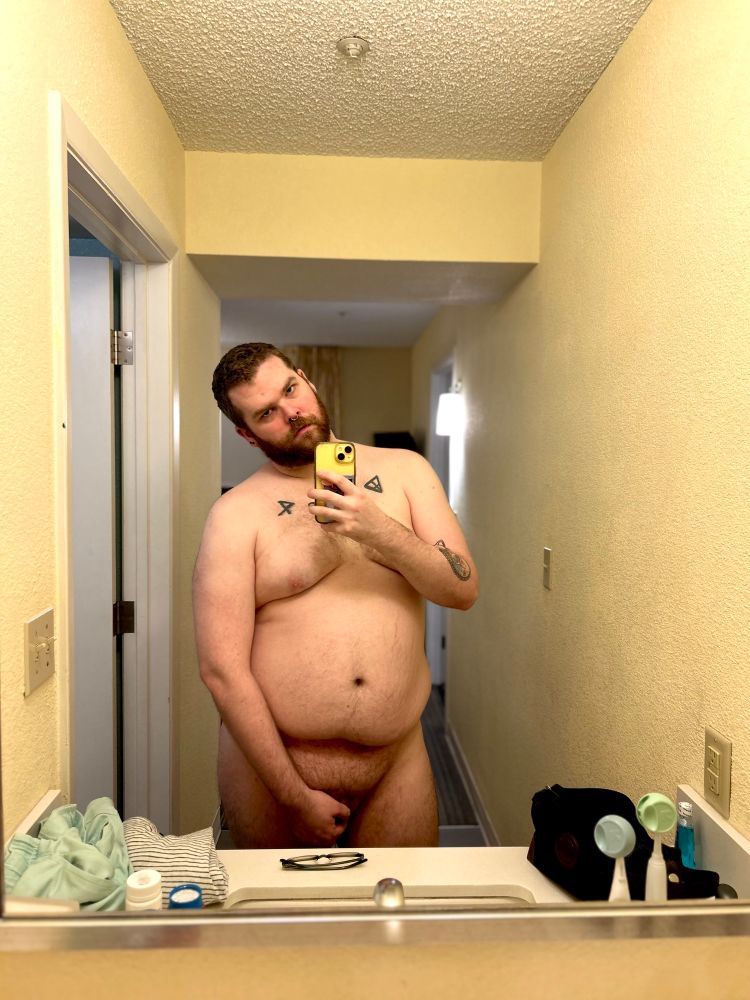 Me standing in bathroom hotel mirror with no clothes on
