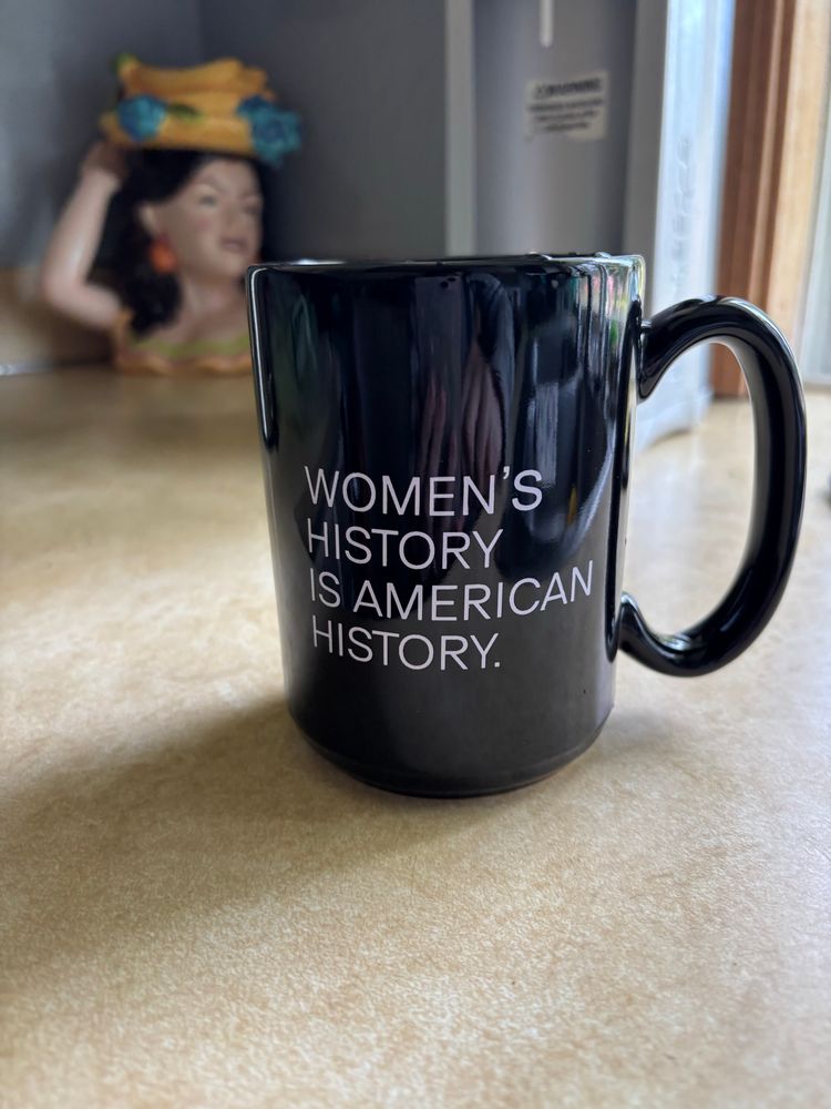 Mug reading “Women’s history is American history”