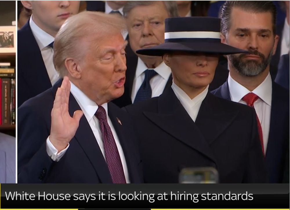 Trump being inaugurated with family behind him