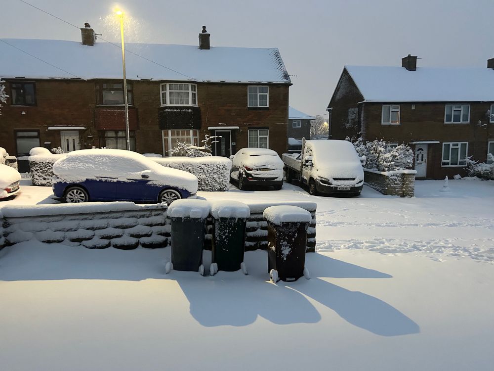 A snowy street in Huddersfield.
