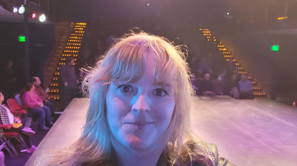 Selfie of me on stage with the crowd behind me