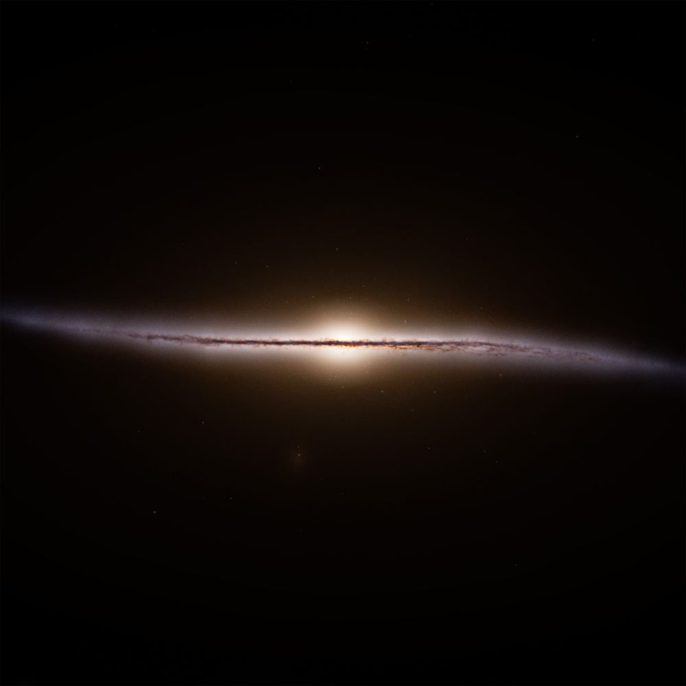 The Milky Way galaxy, showed edge on with a central bulge and warp